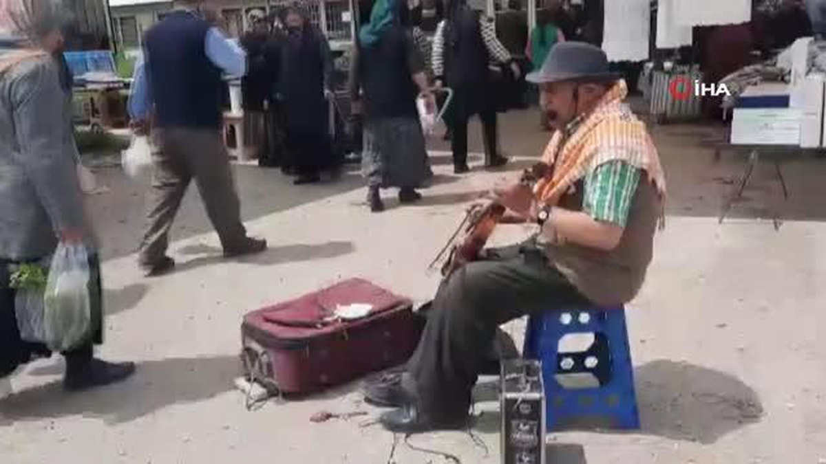 [YEREL / KAMU · Afyonkarahisar · Dinar] 66 yaşındaki Coşkun Dinar'ın tek sokak müzisyeni